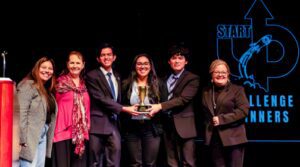 Entrepreneurship students receiving an award for the Start Up Challenge