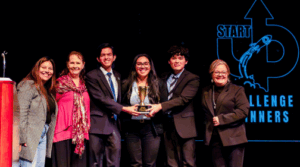 Entrepreneurship students receiving an award for the Start Up Challenge