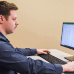 Student studying data on a computer