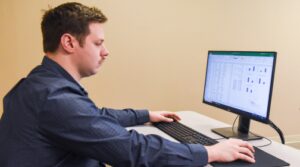 Student studying data on a computer