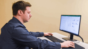 Student studying data on a computer