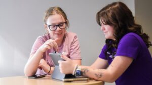 Students studying on iPad