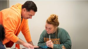 Dr. Taylor teaching math to a student