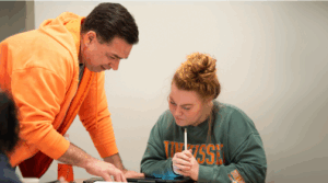 Dr. Taylor teaching math to a student