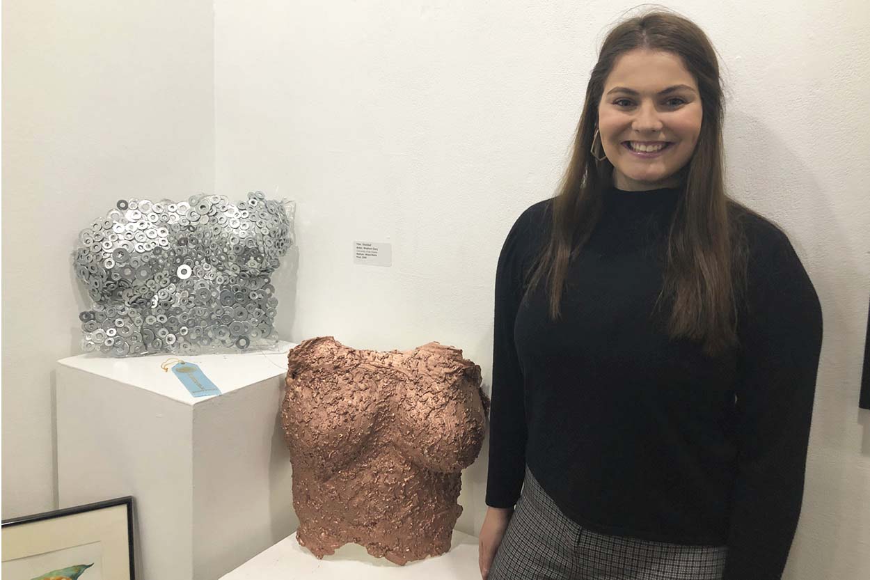 Art major Madison Clary with “Armored Skin.”