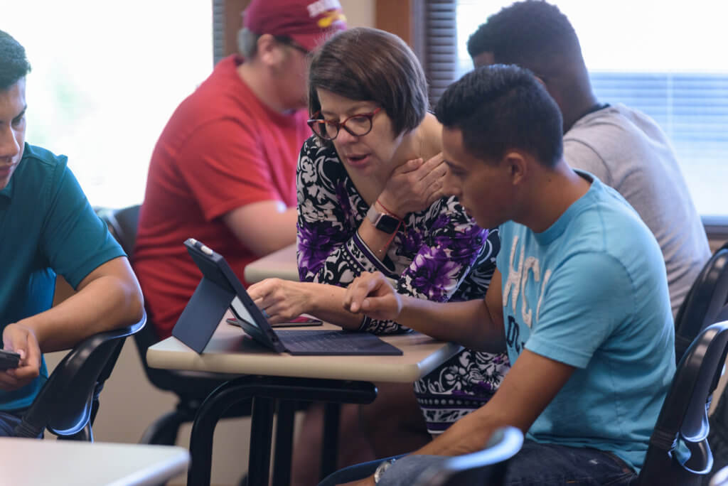 Amy Oatis with students.