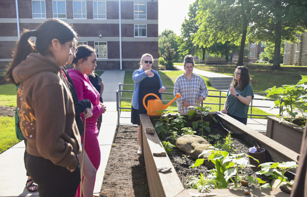 Students Around Campus Greenhouse Garden
