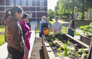 Students Around Campus Greenhouse Garden