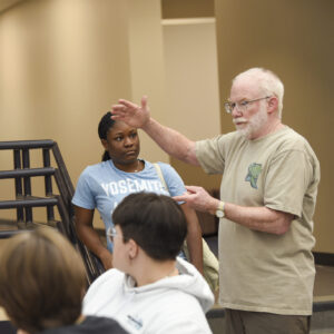Dr. Knight teaching biology course inside science center