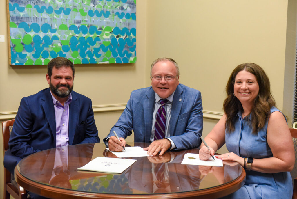 Morgan and Hunter Jackson with President Dunsworth