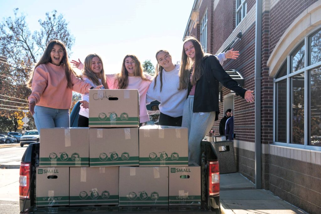 Students participating in can food drive