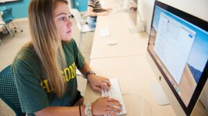 Student studying on a computer