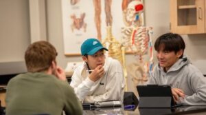 Students studying in exercise science classroom