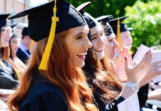 Graduates laughing