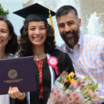 Student holding diploma